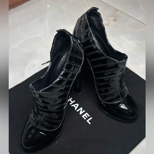 CHANEL heeled leather boots